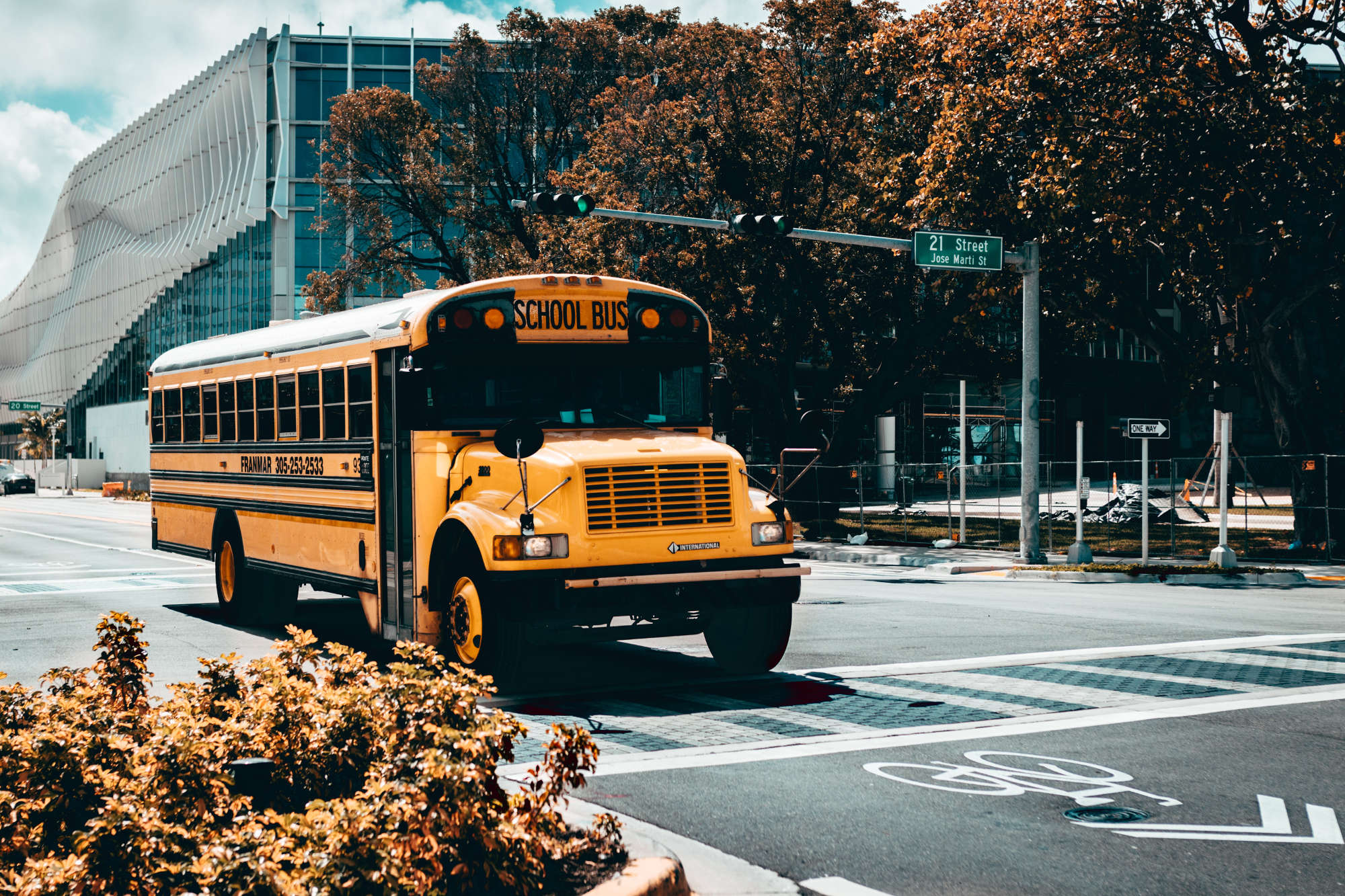 A school bus driving through a city
