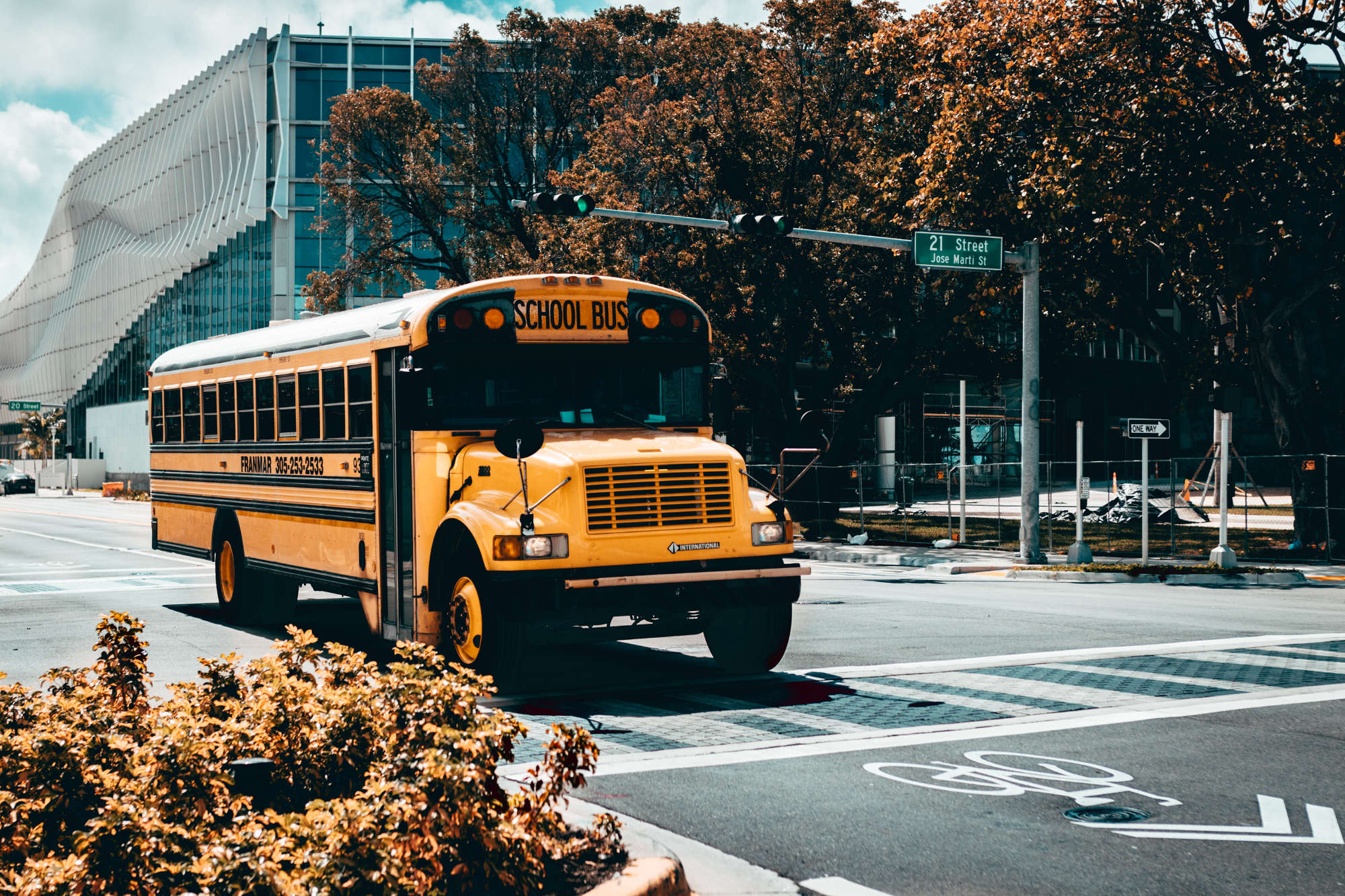 schoolbus A school bus driving through a city