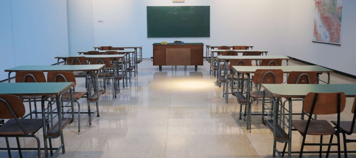 Desks in an empty school room