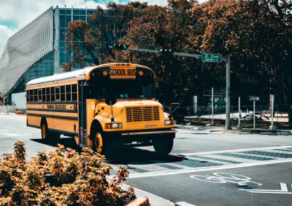 A school bus driving through a city