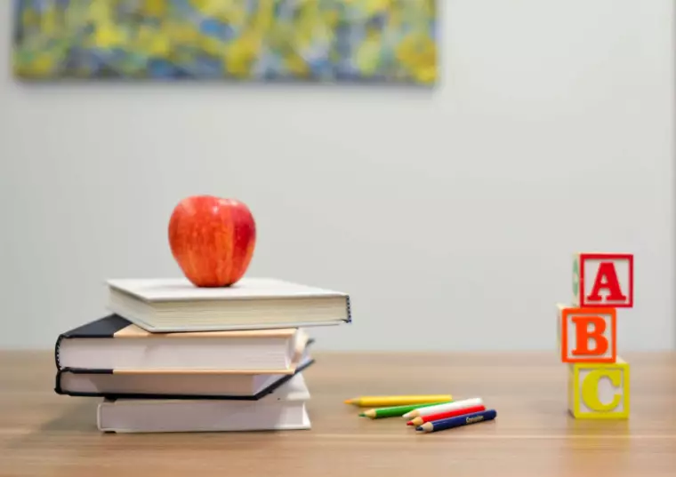 Teaching supplies on a wooden table